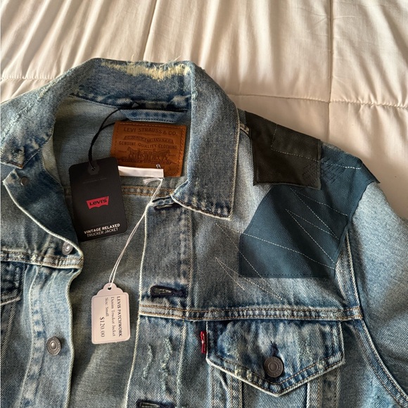 Denim jacket with patches and patterns - Picture 2 of 4